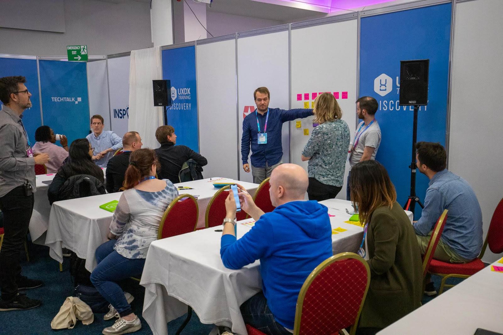 Volunteers and attendees at a UXDX workshop